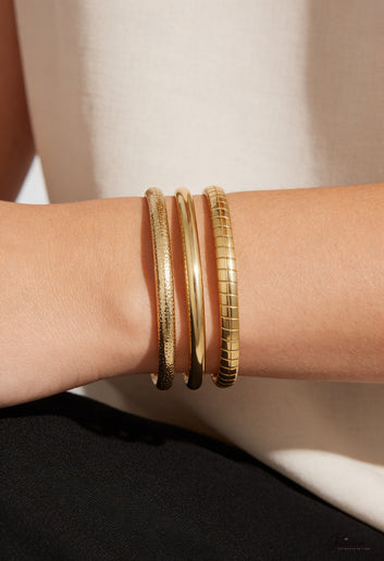 Auréva - Bracelet jonc doré finition petits poids