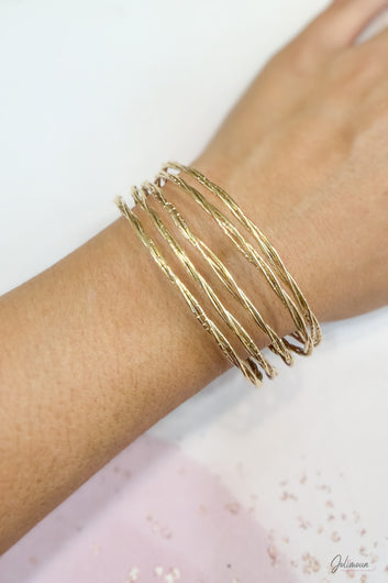 Aline - Bracelet manchette doré 5 joncs torsadés striés ajustable