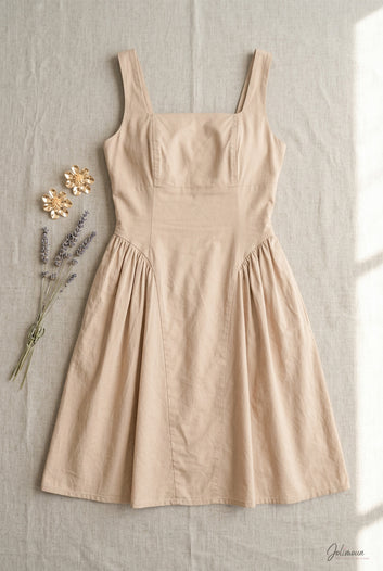 Ariana - Robe courte patineuse beige avec noeud au dos