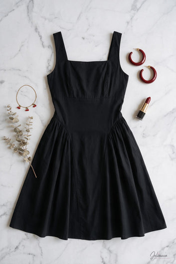 Ariana - Robe courte patineuse noir avec noeud au dos