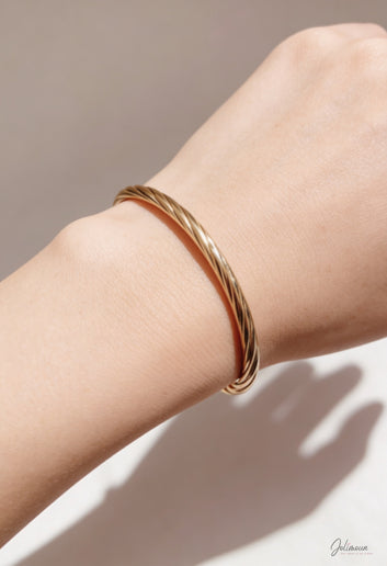 Léonisse - Bracelet jonc torsadé doré en acier inoxydable